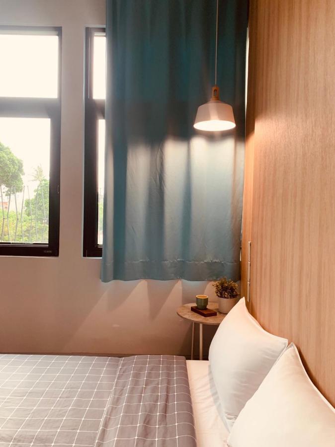 Oyaji Guesthouse-依人數床位數計價開放房型 Tainan Bagian luar foto
